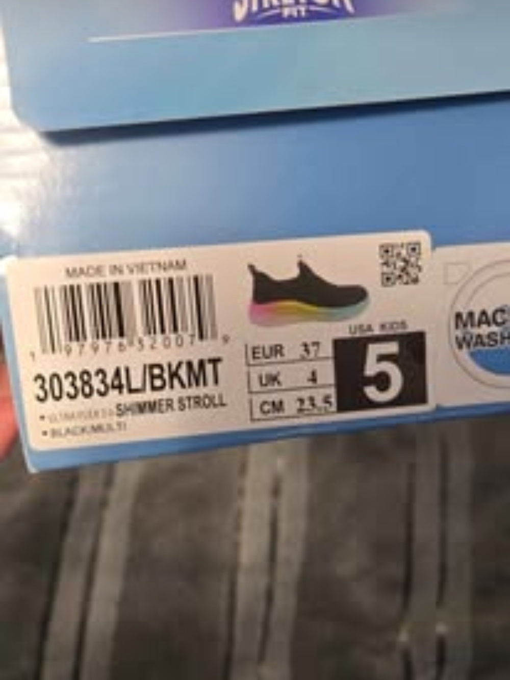 Skechers Kids Black with Rainbow Accent Slip-On Sneakers